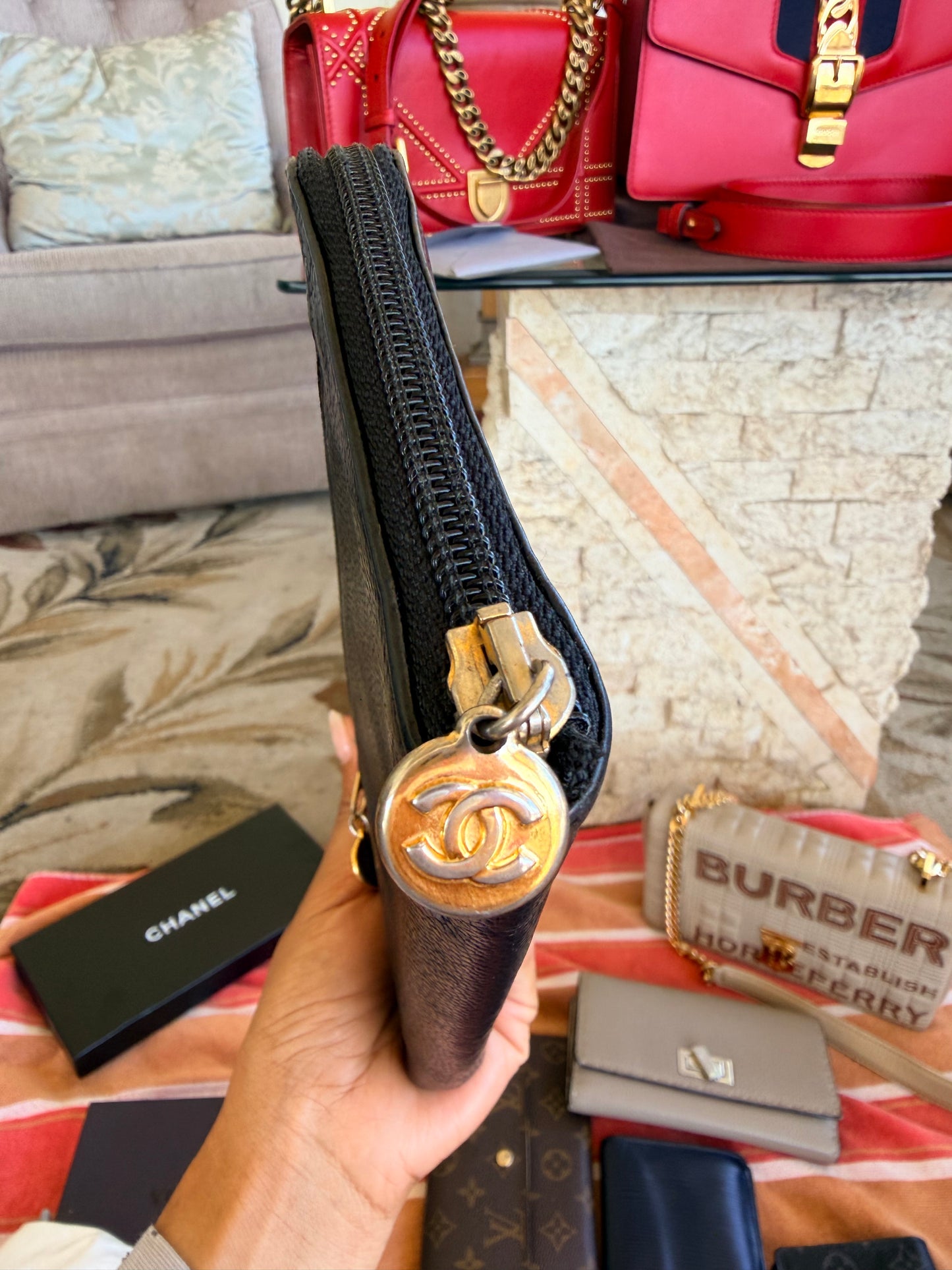 Chanel CC Zipped Wallet in Black Caviar Leather.